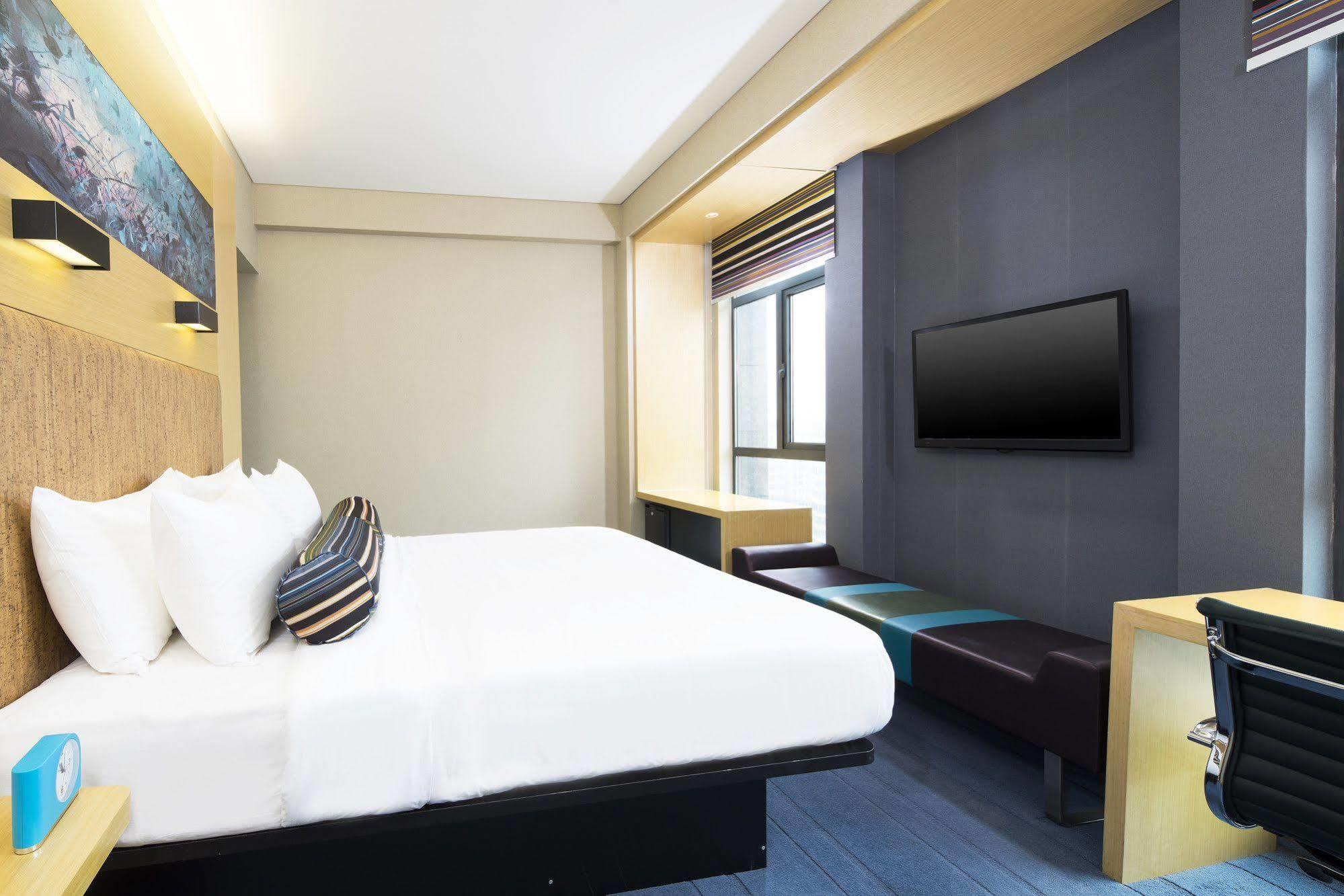 Отель Aloft Yancheng Яньчэн Экстерьер фото